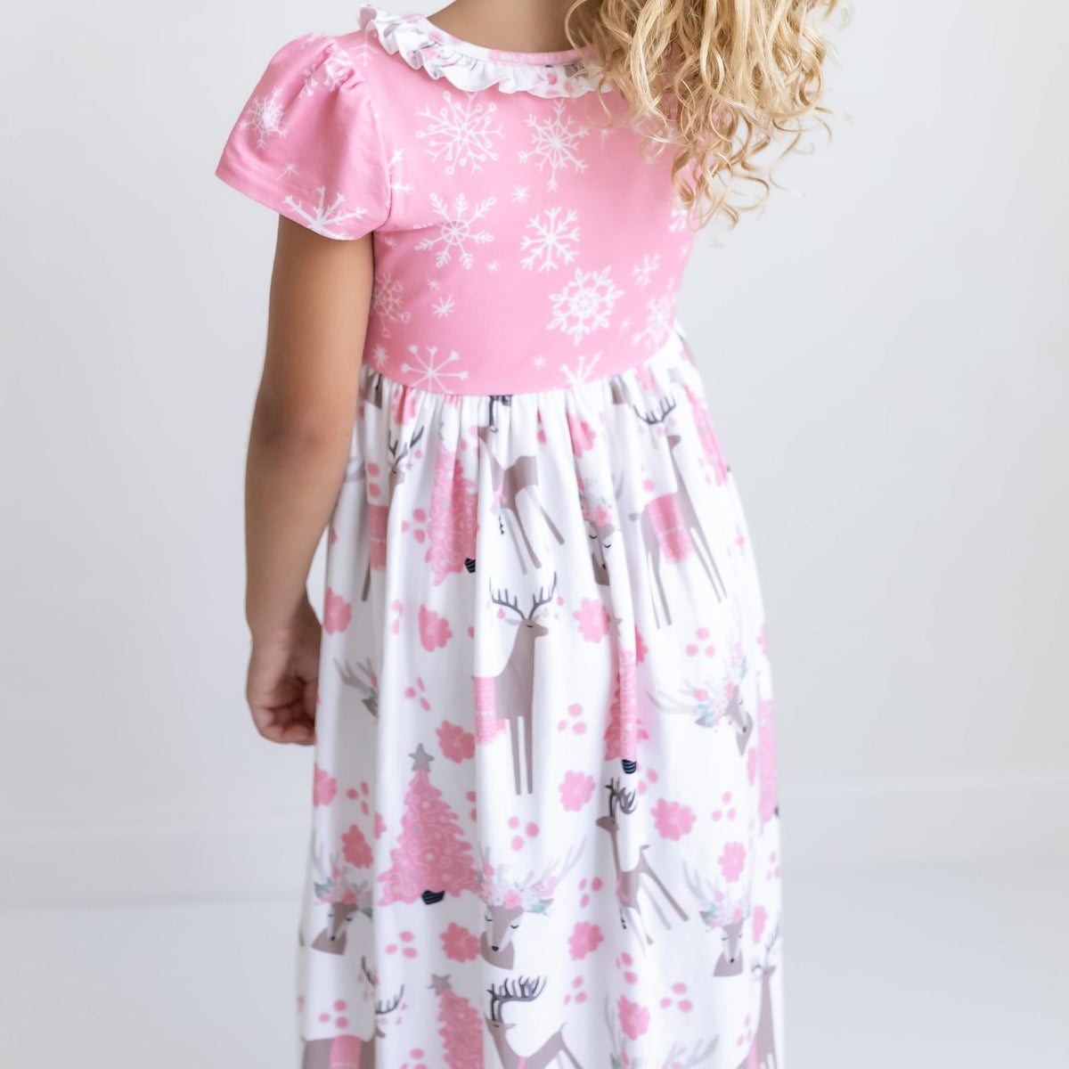 4	Pink deer Christmas lounge gown showing neckline and garment details.