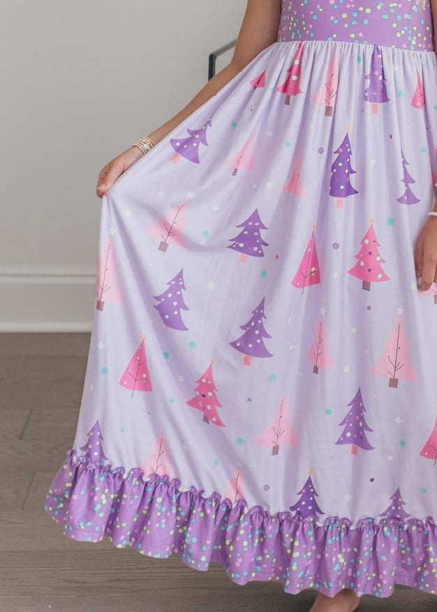 Side view of girls' purple Christmas lounge gown showing pink ruffle trim.

