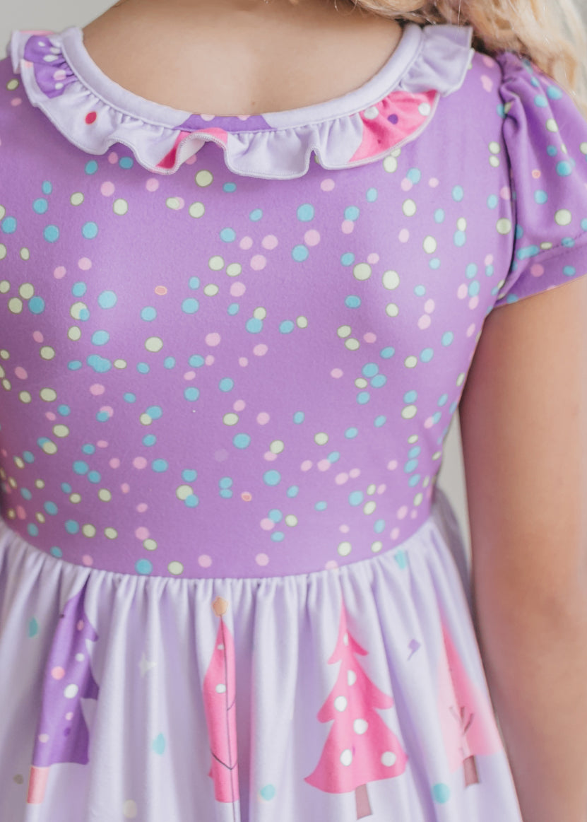 Front view of girls' purple and pink Christmas tree nightgown with ruffle details.