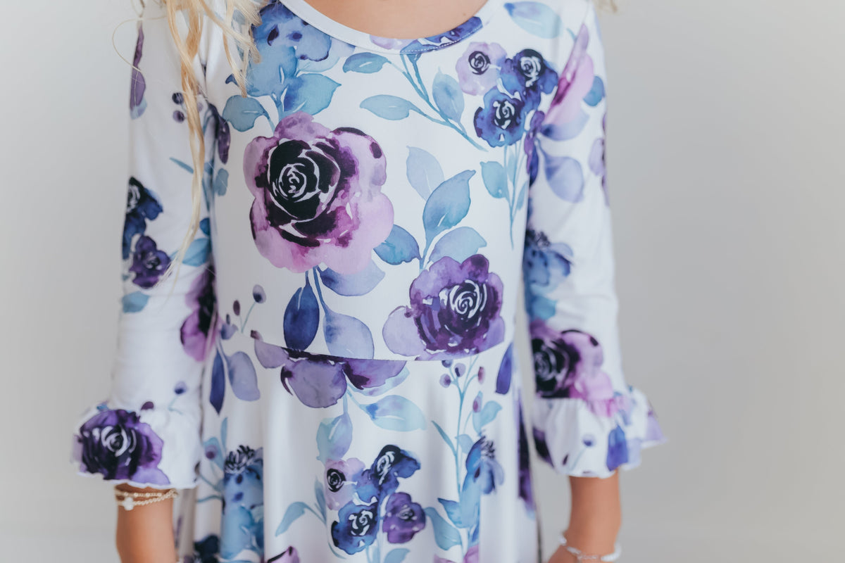 Close-up of the lavender floral fabric and bodice details.